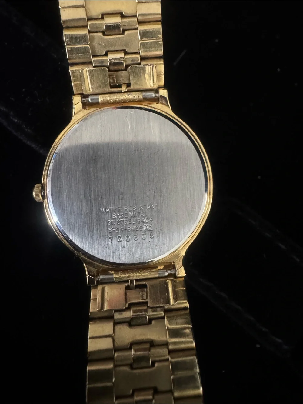 Seiko Gold Tone Watch with White Dial and Roman Numerals